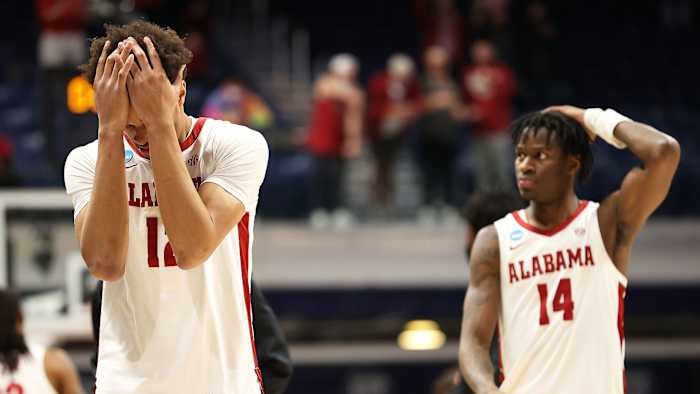 Alabama players react after an NCAA tournament loss to UCLA